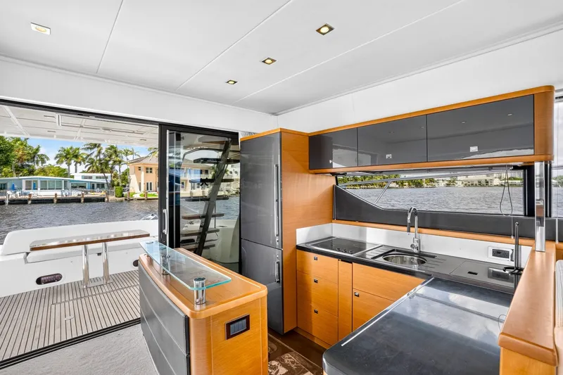 Slide: The Image of Luxurious kitchen interior of 2013 Prestige 620 yacht with waterfront view. - 29