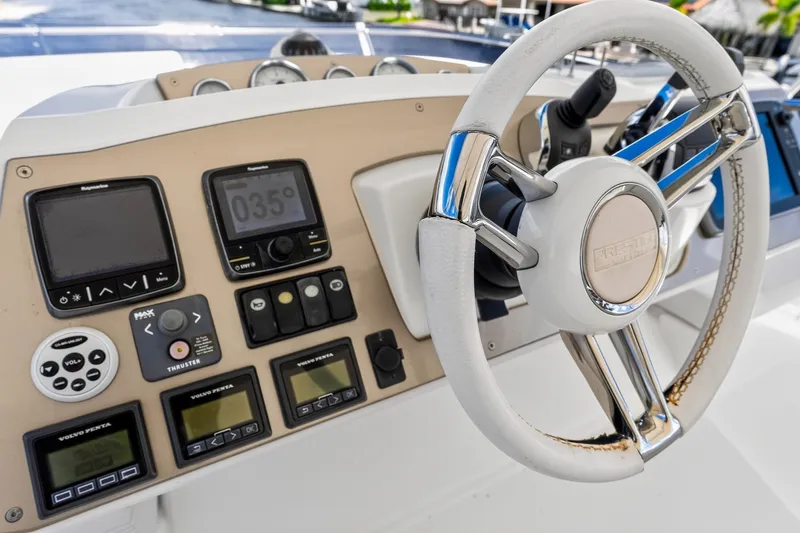 Slide: The Image of Steering wheel and control panel of 2013 Prestige 620 yacht. - 22