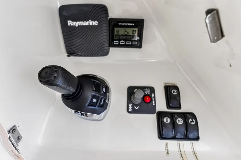 Slide: The Image of Control panel of a 2013 Prestige 620 yacht with Raymarine equipment. - 14