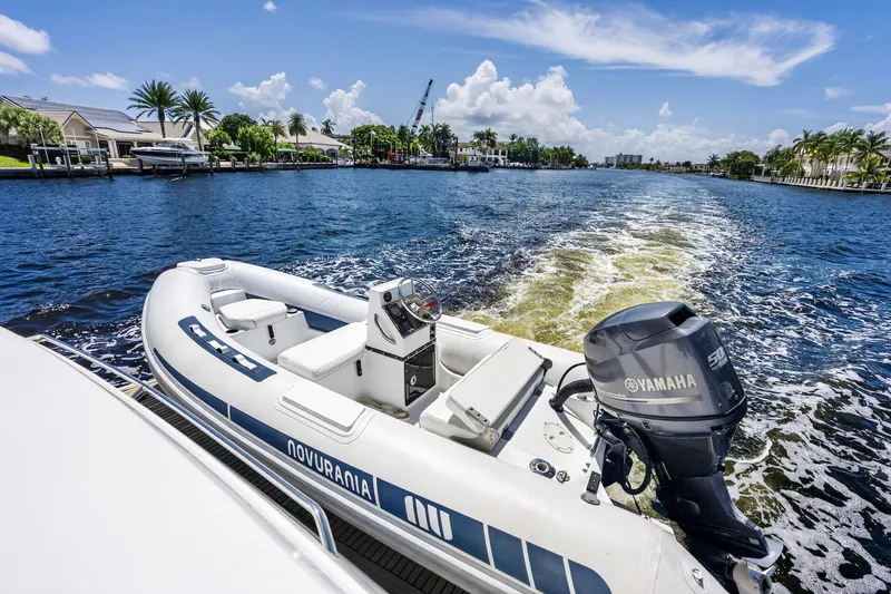 Slide: The Image of Inflatable boat with Yamaha motor cruising on a sunny waterway, Prestige 620, 2013. - 62