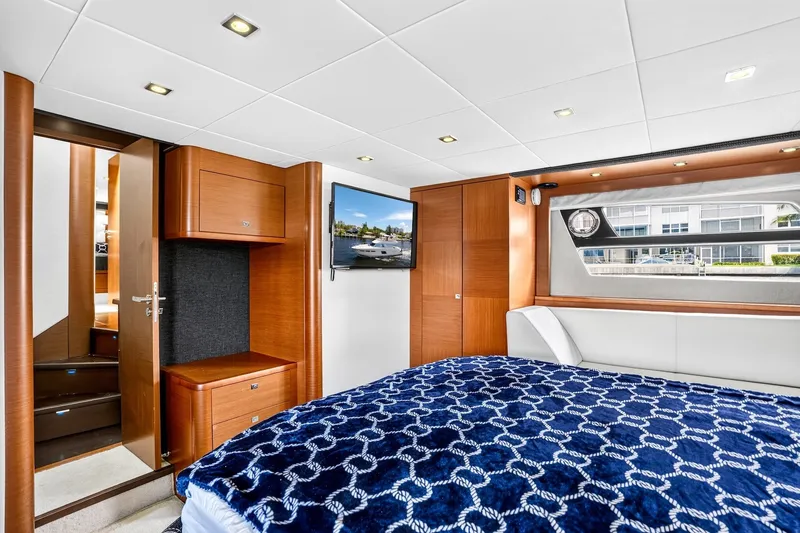 Slide: The Image of Luxurious cabin interior of 2013 Prestige 620 yacht with modern wood finishes. - 43