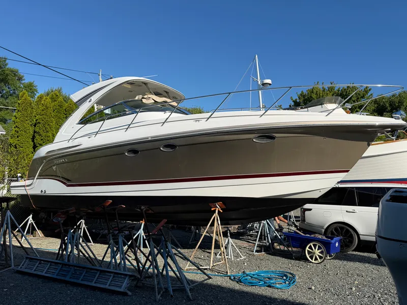 Slide: The Image of 2009 Formula 34 Performance Cruiser on stands, featuring sleek design and spacious cockpit. - 1