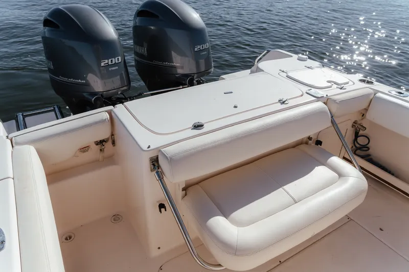 Slide: The Image of 2016 Grady-White Fisherman 257 boat with twin Yamaha 200 engines on calm water. - 15