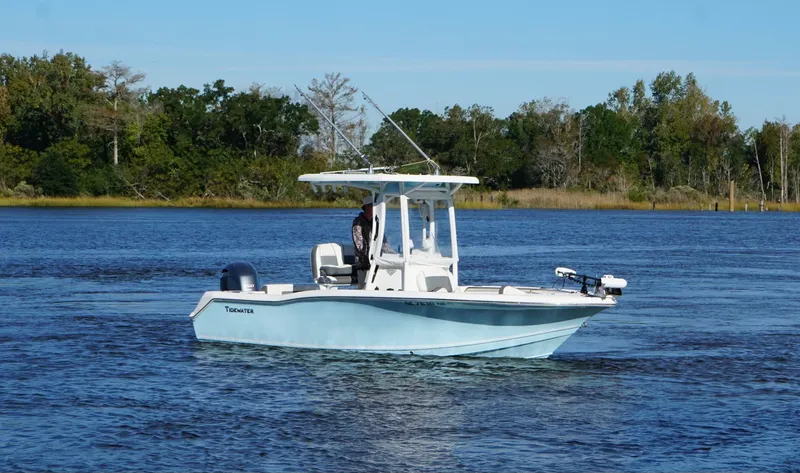 The Image of A 2020 Tidewater 210 CC Adventure boat on calm water with a driver on board. - 0