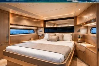 Slide: The Image of Luxurious bedroom interior of 2026 Monarch 45 GT yacht with elegant wood finishes. - 2