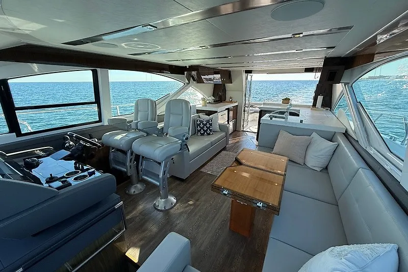Slide: The Image of Luxurious interior of 2023 Cruisers Yachts 60 Fly with ocean view. - 12