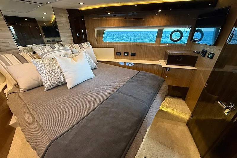 Slide: The Image of Luxurious bedroom interior of 2023 Cruisers Yachts 60 Fly with ocean view. - 19