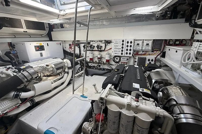 Slide: The Image of Engine room of 2023 Cruisers Yachts 60 Fly, showcasing advanced machinery and equipment. - 46