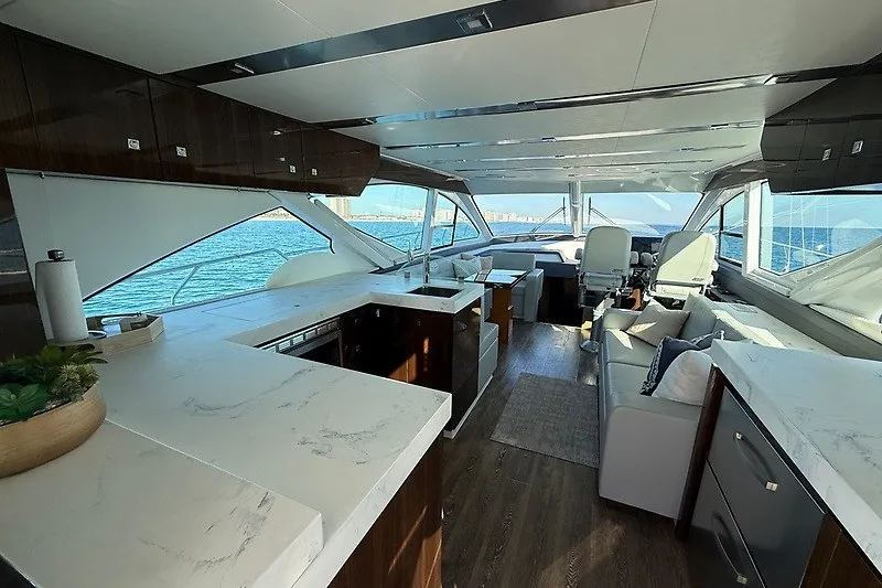 Slide: The Image of Luxurious interior of 2023 Cruisers Yachts 60 Fly with modern design and ocean view. - 7