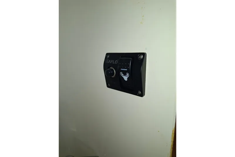 Slide: The Image of Switch panel on 1992 Luhrs Tournament 300 boat interior wall. - 27