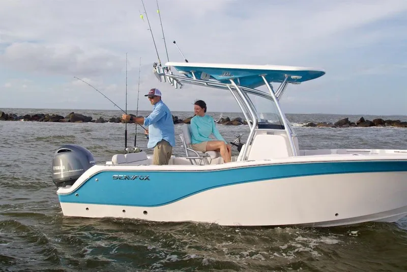 Slide: The Image of Manufacturer Provided Image: 2022 Sea Fox 228 Commander boat on water with two people fishing. - 4