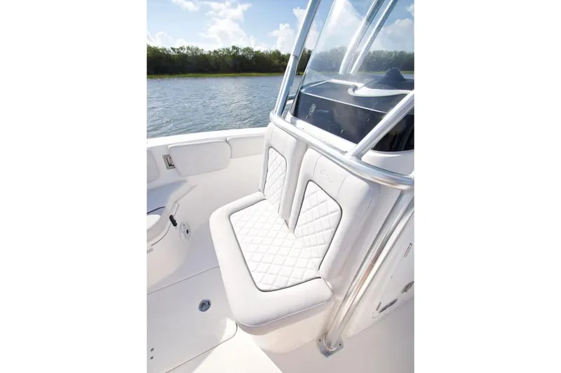 Slide: The Image of Manufacturer Provided Image: 2022 Sea Fox 228 Commander boat with cushioned seating by the water. - 9