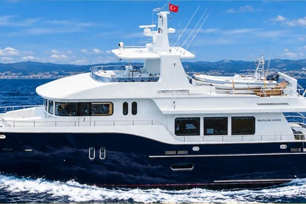 The Image of Luxury yacht Monarch 75 Dauntless 2026 cruising on open sea. - 1