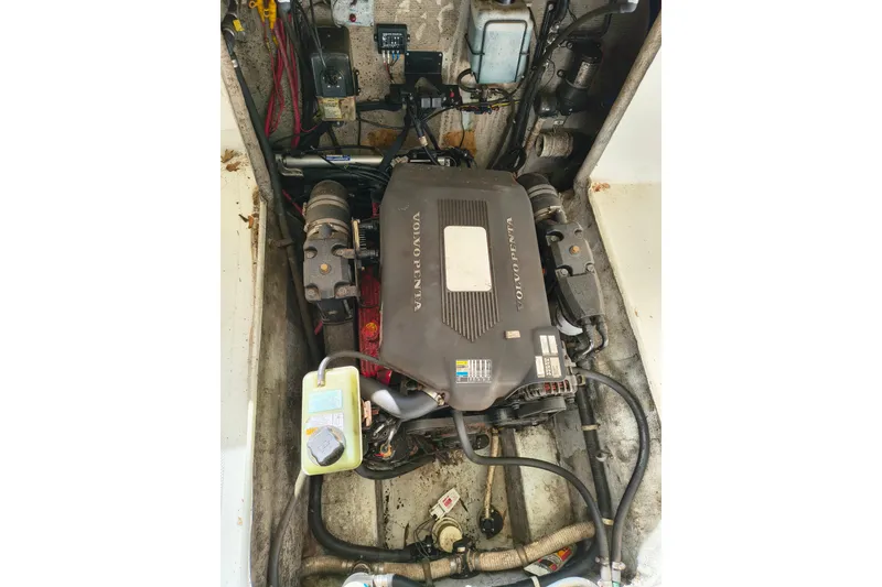 Slide: The Image of Engine compartment of a 2004 Osprey 26 Fisherman boat with Volvo Penta engine. - 16