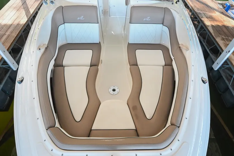 Slide: The Image of 2001 Sea Ray 290 Select EX boat interior with beige and white seating. - 12