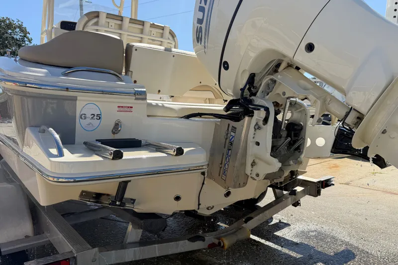 Slide: The Image of 2022 Pioneer 202 Islander boat with outboard motor on trailer. - 19