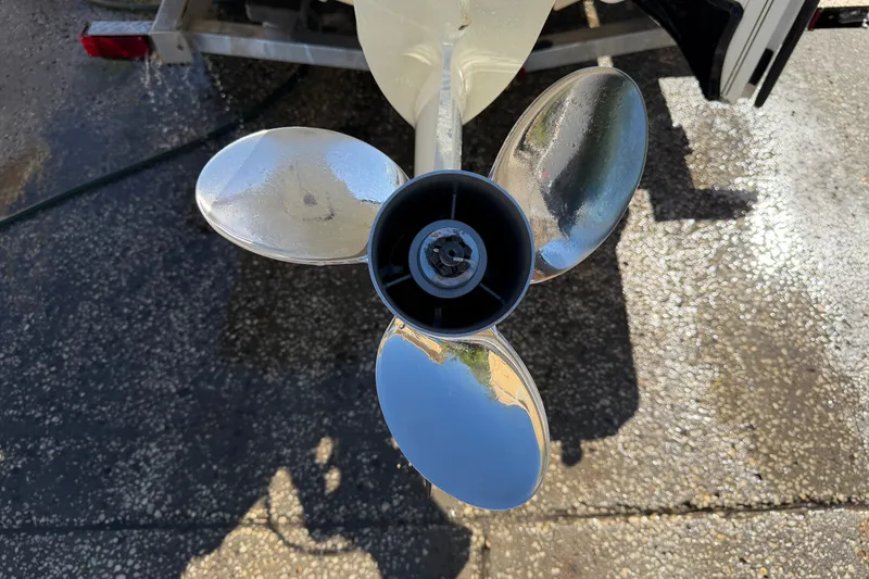 Slide: The Image of Shiny propeller of a 2022 Pioneer 202 Islander boat on a trailer. - 20