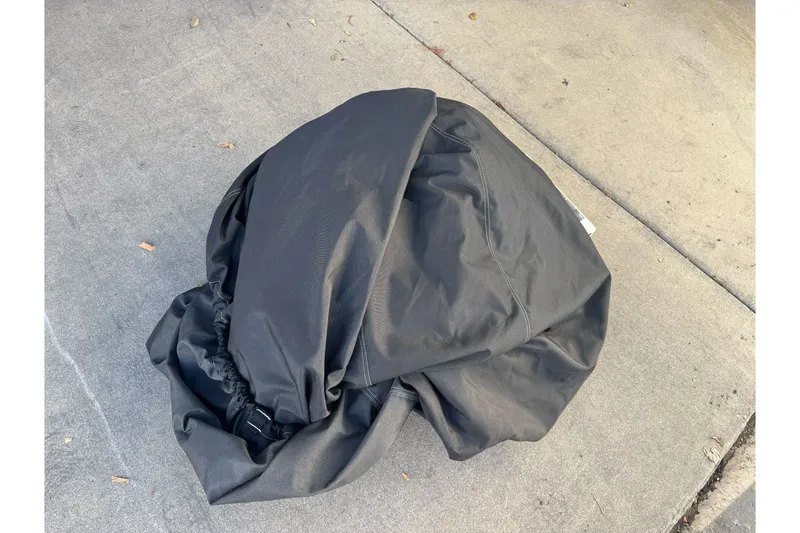 Slide: The Image of Black boat cover on pavement for 2020 Tracker Pro Team 175. - 19