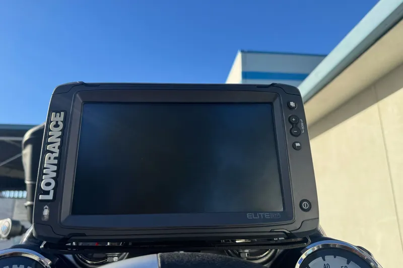 Slide: The Image of Lowrance Elite fish finder on 2020 Tracker Pro Team 175 boat under clear blue sky. - 14