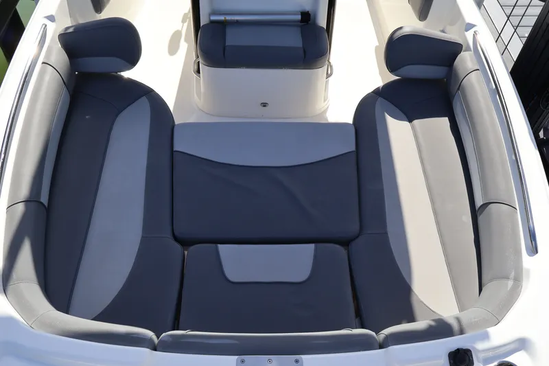 Slide: The Image of 2023 NauticStar 251 Hybrid boat interior with gray cushioned seating. - 46