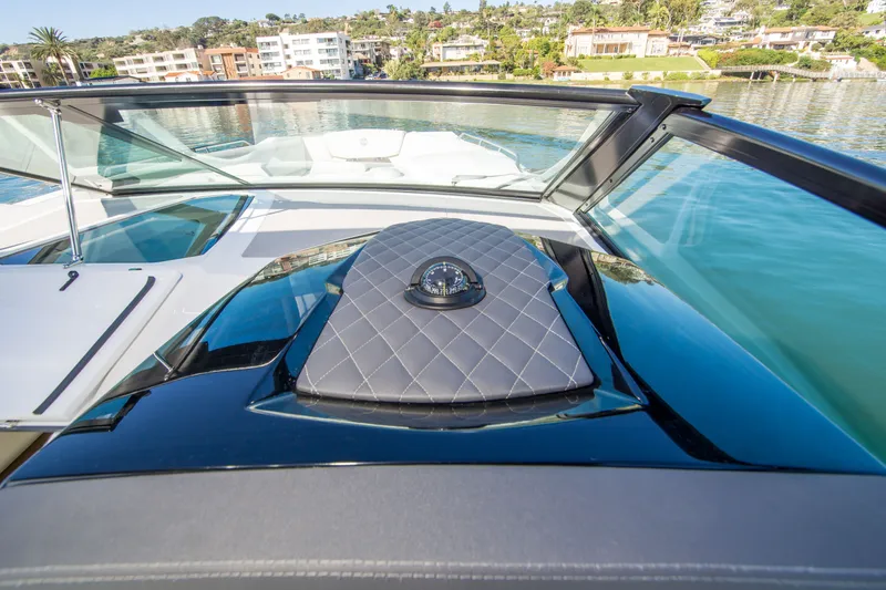 Slide: The Image of 2020 Cruisers Sport Series 338 Bow Rider, luxurious interior, waterfront view. - 21