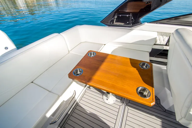 Slide: The Image of Luxurious seating area on 2020 Cruisers Sport Series 338 Bow Rider boat. - 13