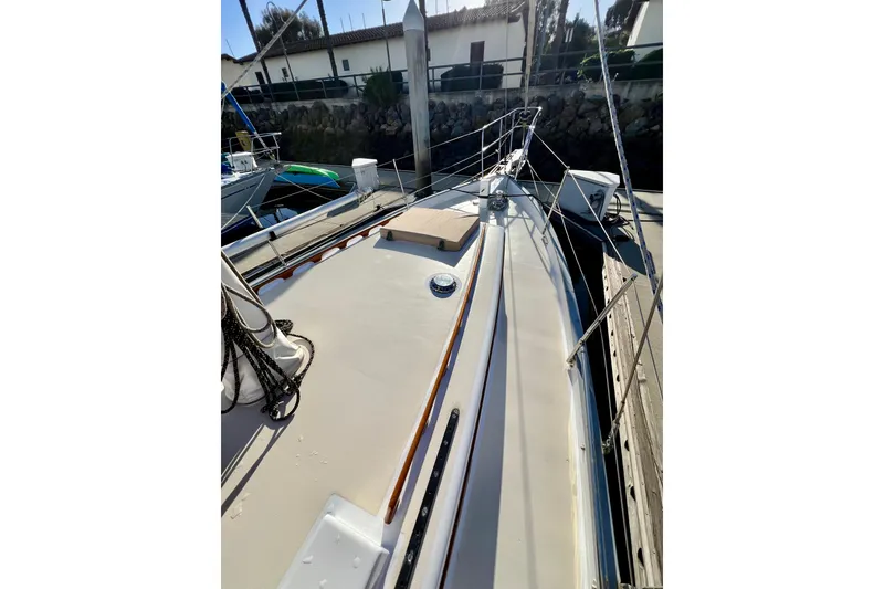 Slide: The Image of 1975 Cape George 36 sailboat deck view, docked in a marina. - 21
