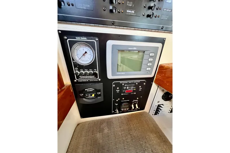 Slide: The Image of Control panel of a 1975 Cape George 36 sailboat with gauges and displays. - 51