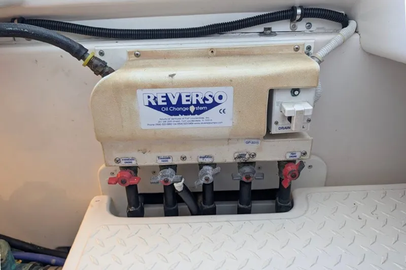 Slide: The Image of Reverso oil change system in 2006 Tiara Yachts 3900 Convertible engine compartment. - 35