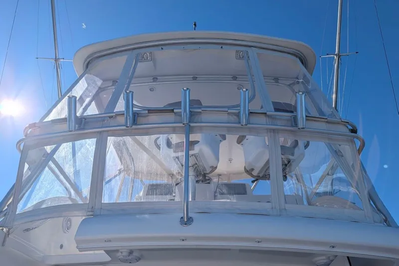 Slide: The Image of Tiara Yachts 3900 Convertible 2006, flybridge view under clear blue sky. - 17