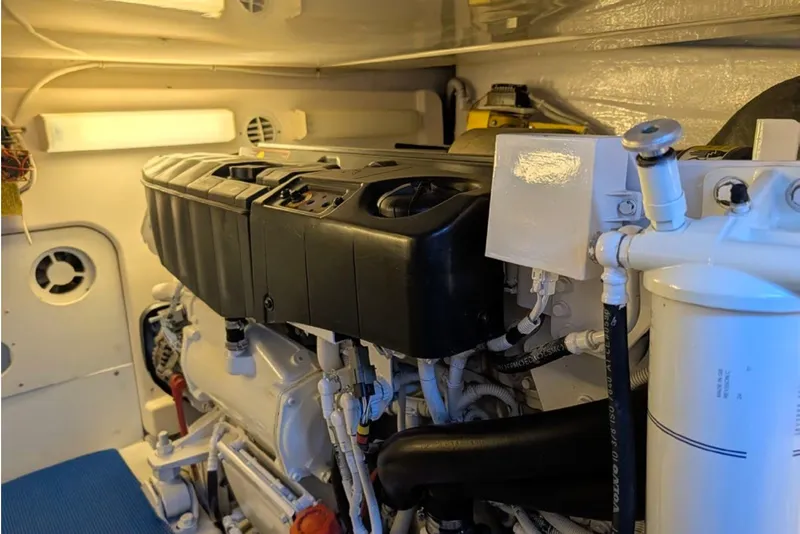 Slide: The Image of Engine room of a 2006 Tiara Yachts 3900 Convertible, showcasing mechanical components. - 36