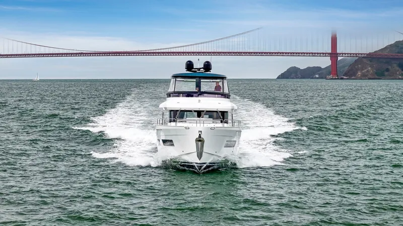 Slide: The Image of A 2020 Sirena 64 yacht cruising under the Golden Gate Bridge. - 7
