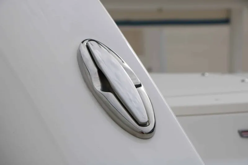 Slide: The Image of Close-up of a shiny metal fitting on a white boat. - 20