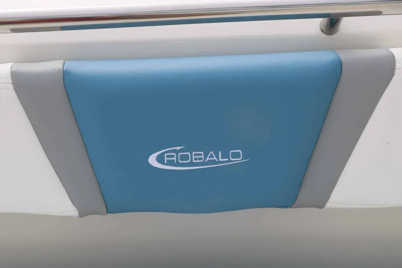 Slide: The Image of Close-up of a blue and gray cushion with the Robalo logo. - 32