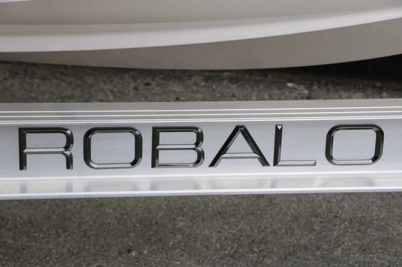 Slide: The Image of Close-up of the Robalo logo on a boat. - 26