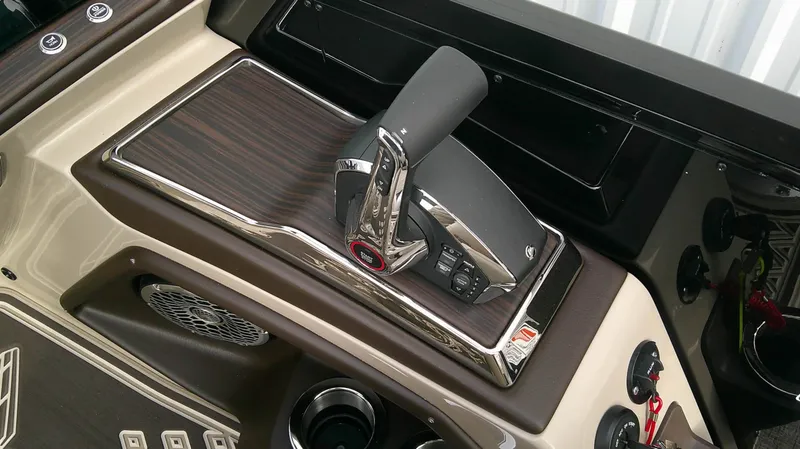 Slide: The Image of Close-up of a Bennington 25 QXSBA boat's helm with modern controls. - 10