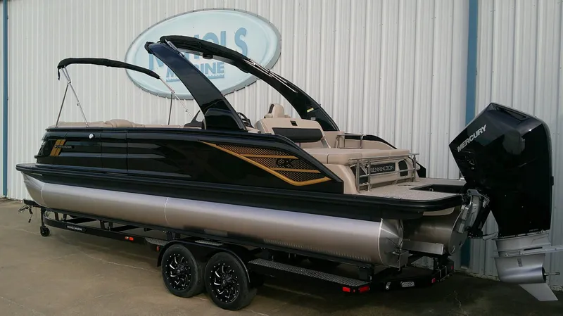 Slide: The Image of Bennington 25 QXSBA 2027: Sleek pontoon boat with black hull, luxurious seating, and powerful outboard motor. - 4
