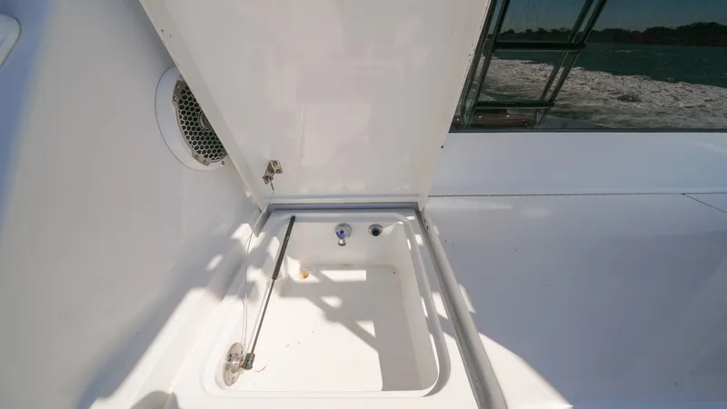 Slide: The Image of Cockpit Fish Box with Lid Open - 26