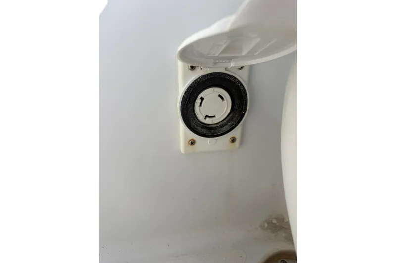Slide: The Image of Boat electrical outlet on a 2007 Andros 26 Tarpon. - 32