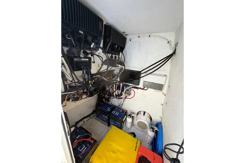 Slide: The Image of Electrical components and wiring inside a 2007 Andros 26 Tarpon boat. - 25