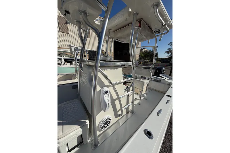 Slide: The Image of 2007 Andros 26 Tarpon boat interior with seating and stainless steel railings. - 13