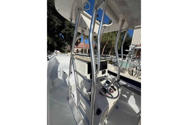 Slide: The Image of 2007 Andros 26 Tarpon boat interior with steering wheel and control panel. - 6