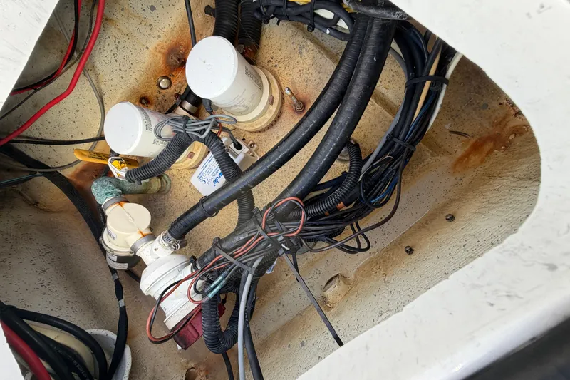 Slide: The Image of Electrical wiring and components inside a 2007 Andros 26 Tarpon boat. - 27