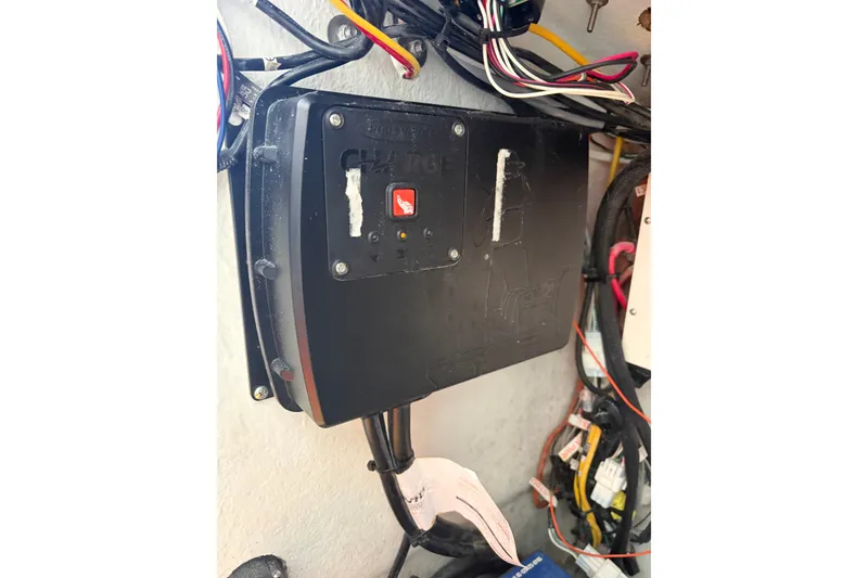 Slide: The Image of Electrical panel with wiring inside a 2007 Andros 26 Tarpon boat. - 31