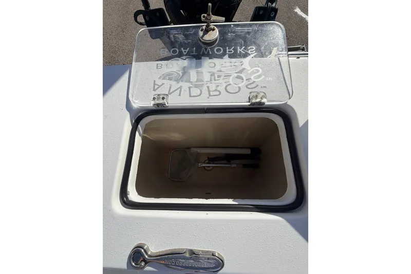 Slide: The Image of Open storage compartment on a 2007 Andros 26 Tarpon boat. - 22