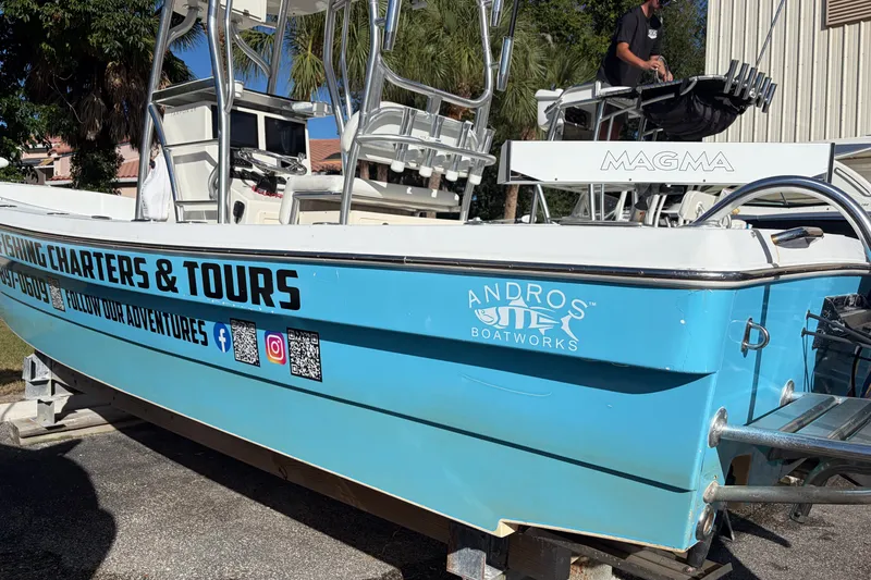 Slide: The Image of Blue 2007 Andros 26 Tarpon boat with fishing charters and tours branding. - 3