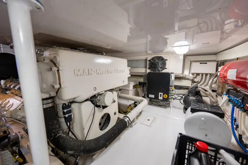 Slide: The Image of Engine room of 2005 Viking 45 Convertible yacht with MAN marine diesel engine. - 36