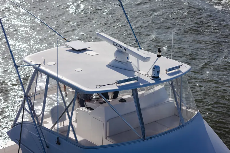 Slide: The Image of 2005 Viking 45 Convertible yacht with Garmin radar on open water. - 14