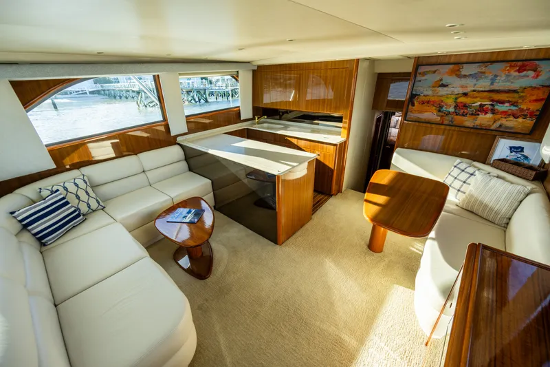 Slide: The Image of Luxurious interior of 2005 Viking 45 Convertible yacht with elegant seating and modern decor. - 22
