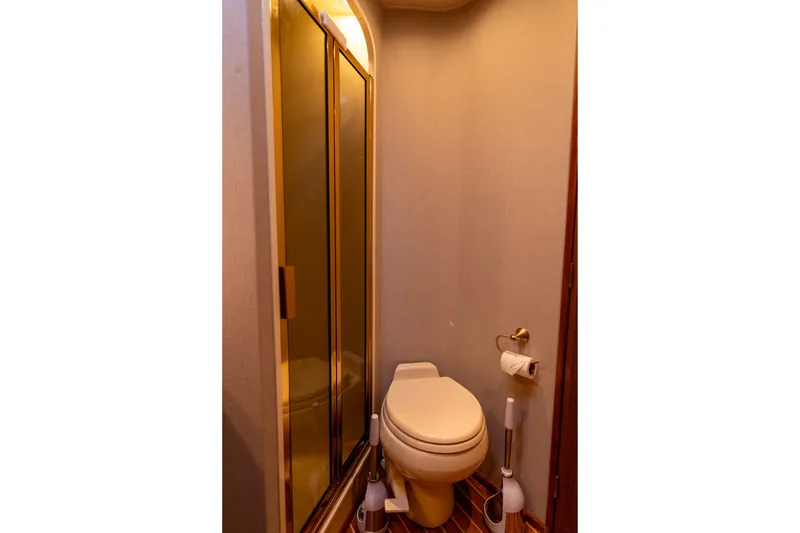 Slide: The Image of Bathroom interior of 2005 Viking 45 Convertible yacht with shower and toilet. - 32